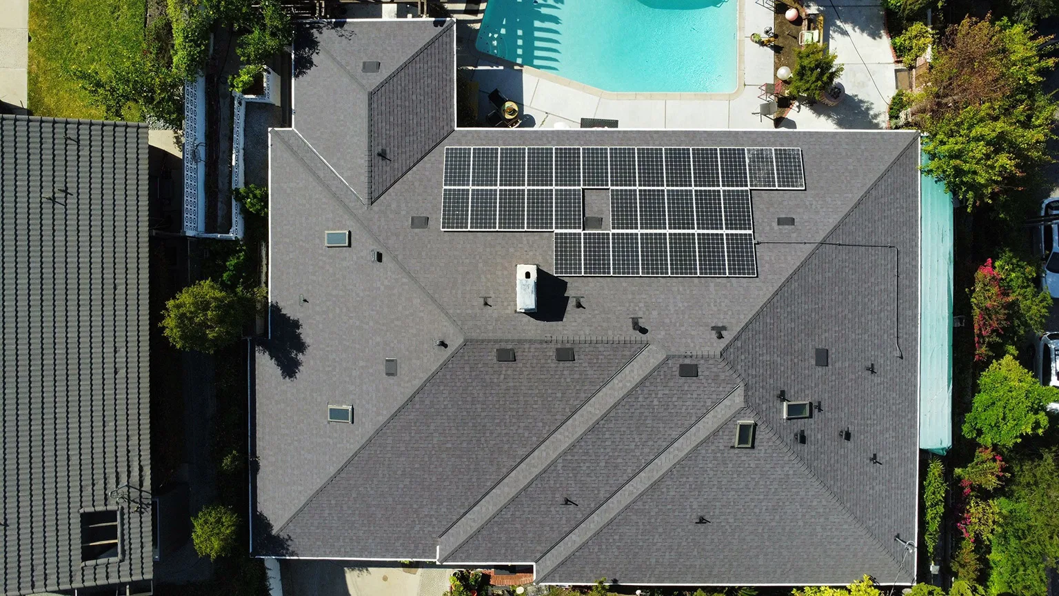 Roof after replacement by RAA Construction Group - new architectural shingle install with solar